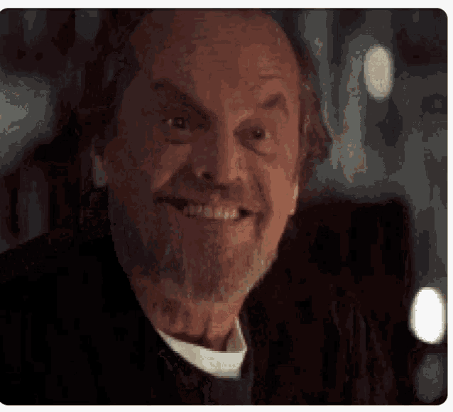 An elder Jack Nicholson nods in agreement with a mischievous grin