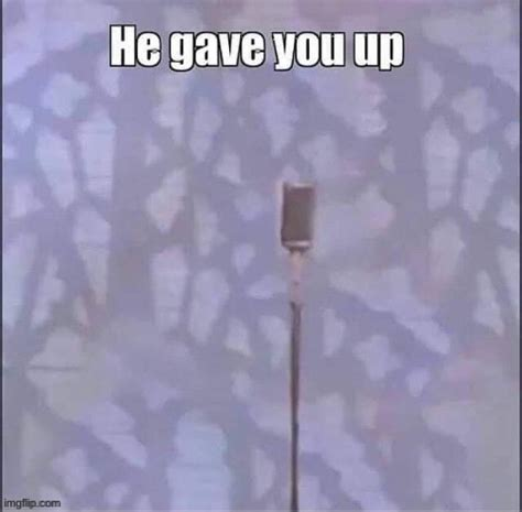 a picture from song "never gonna give you up" with microphone and no Rick Astley with top text saying "he gave you up"