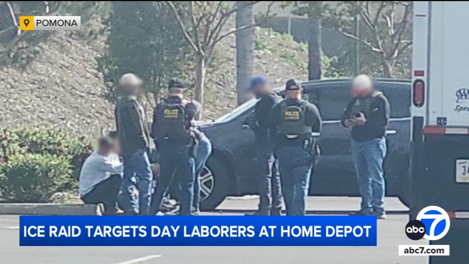 US Immigration Enforcement officers detaining a human person at Home Depot.