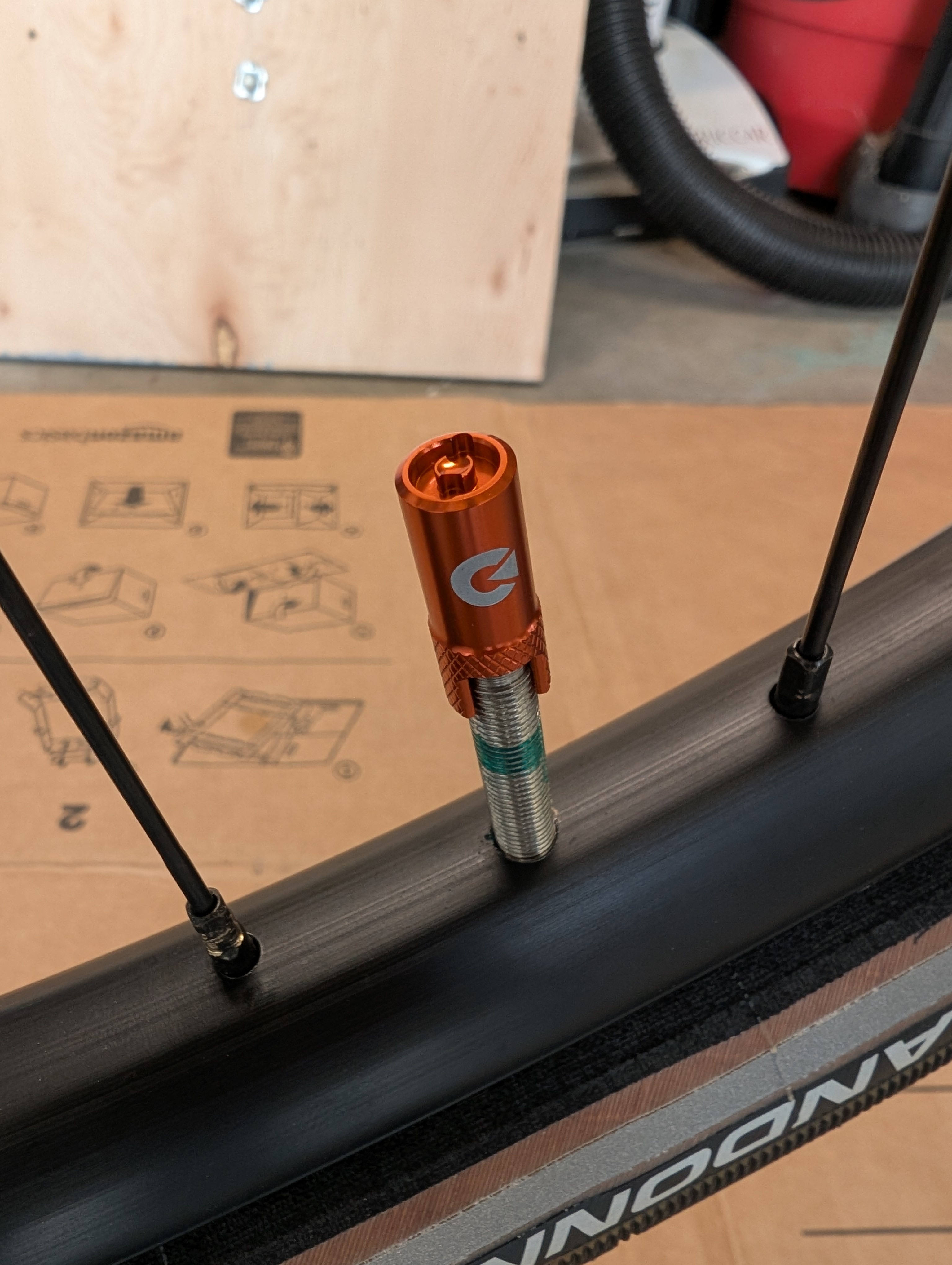 orange aluminum dust cap on a Clik valve