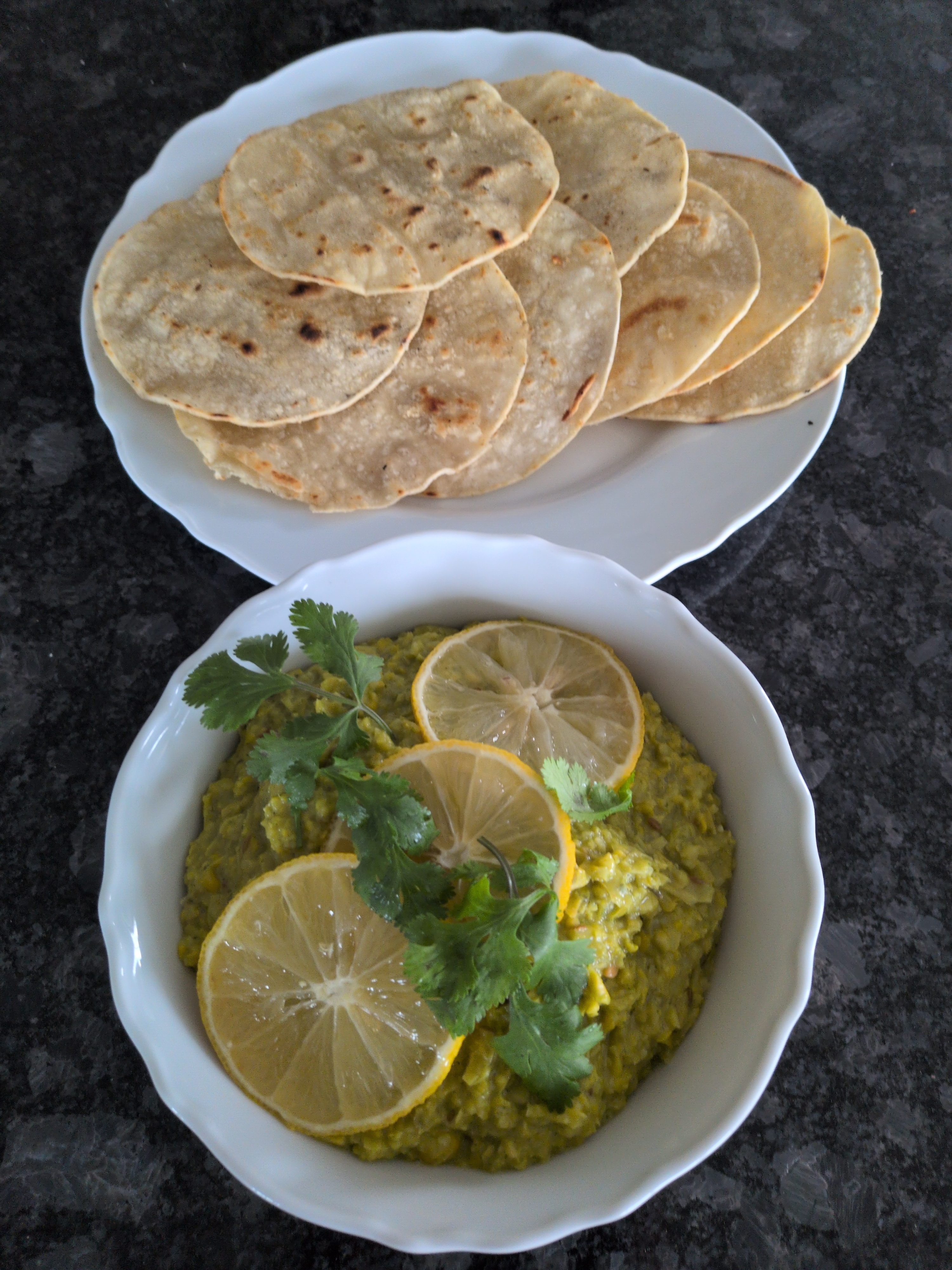 blended corn dish garnished with lemon and cilantro