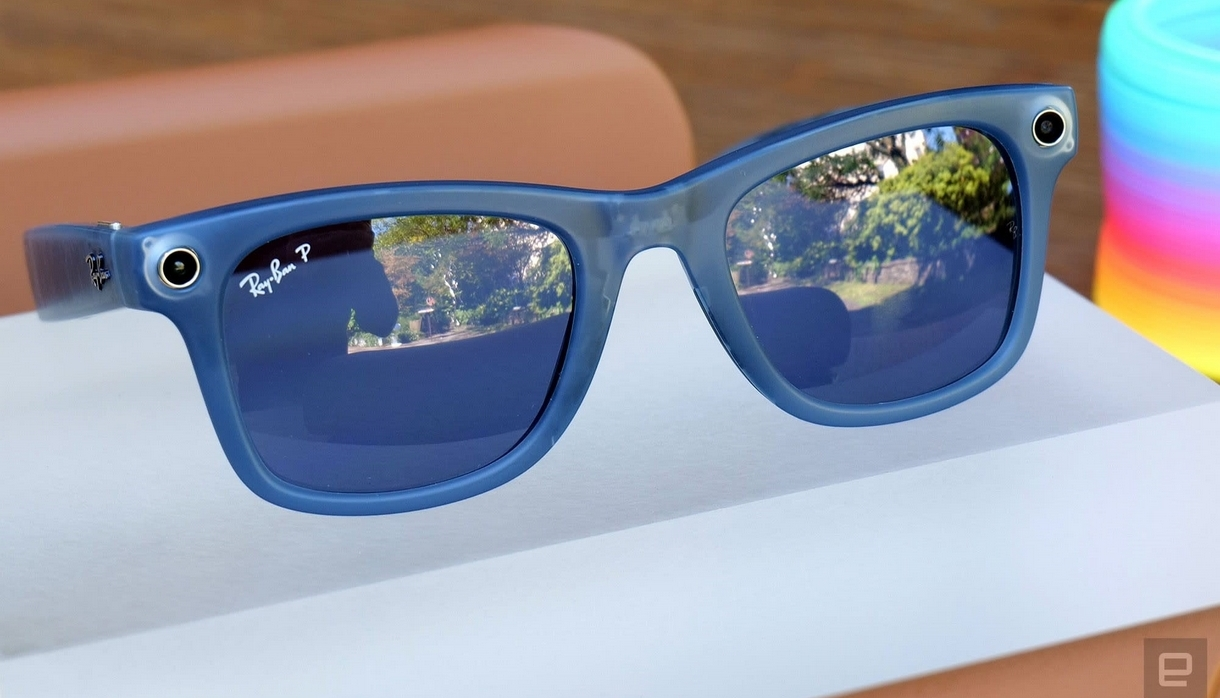 Meta AI glasses in blue/silver with dark lenses