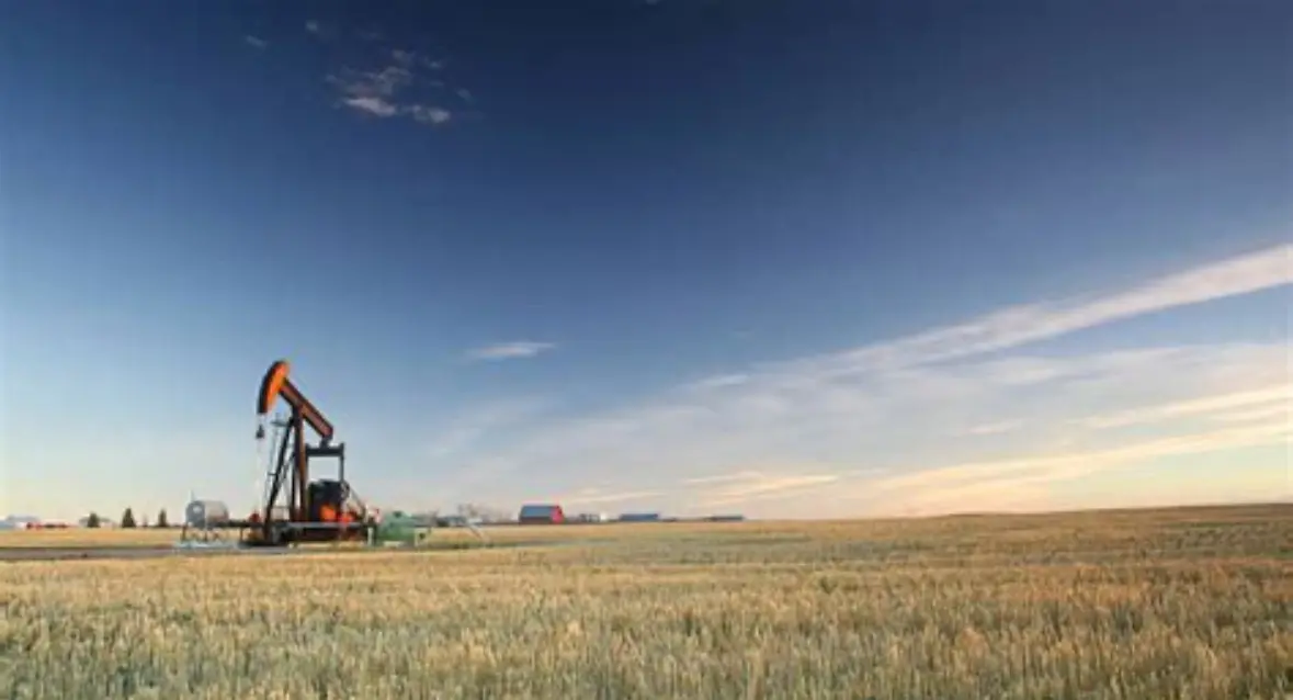 boring Kansas plains with oil rig
