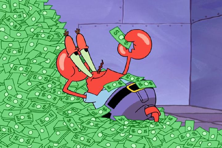 Mr Krabs from Spongebob, lying in a pile of money.