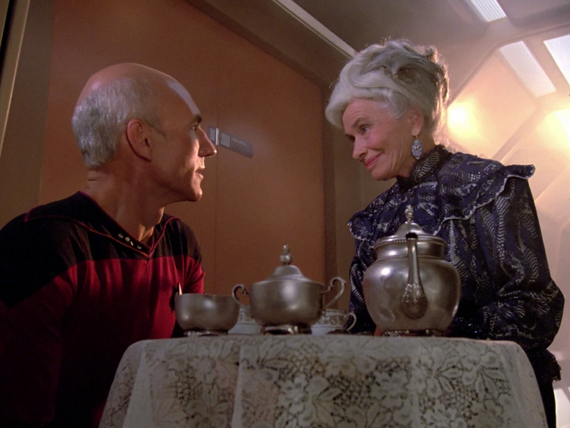 Screenshot of Star Trek: The Next Generation S01E06 "Where No One Has Gone Before" depicting Jean-Luc Picard (Patrick Stewart) and his hallucination (Herta Ware) of what his mother would look like if she had lived to old age