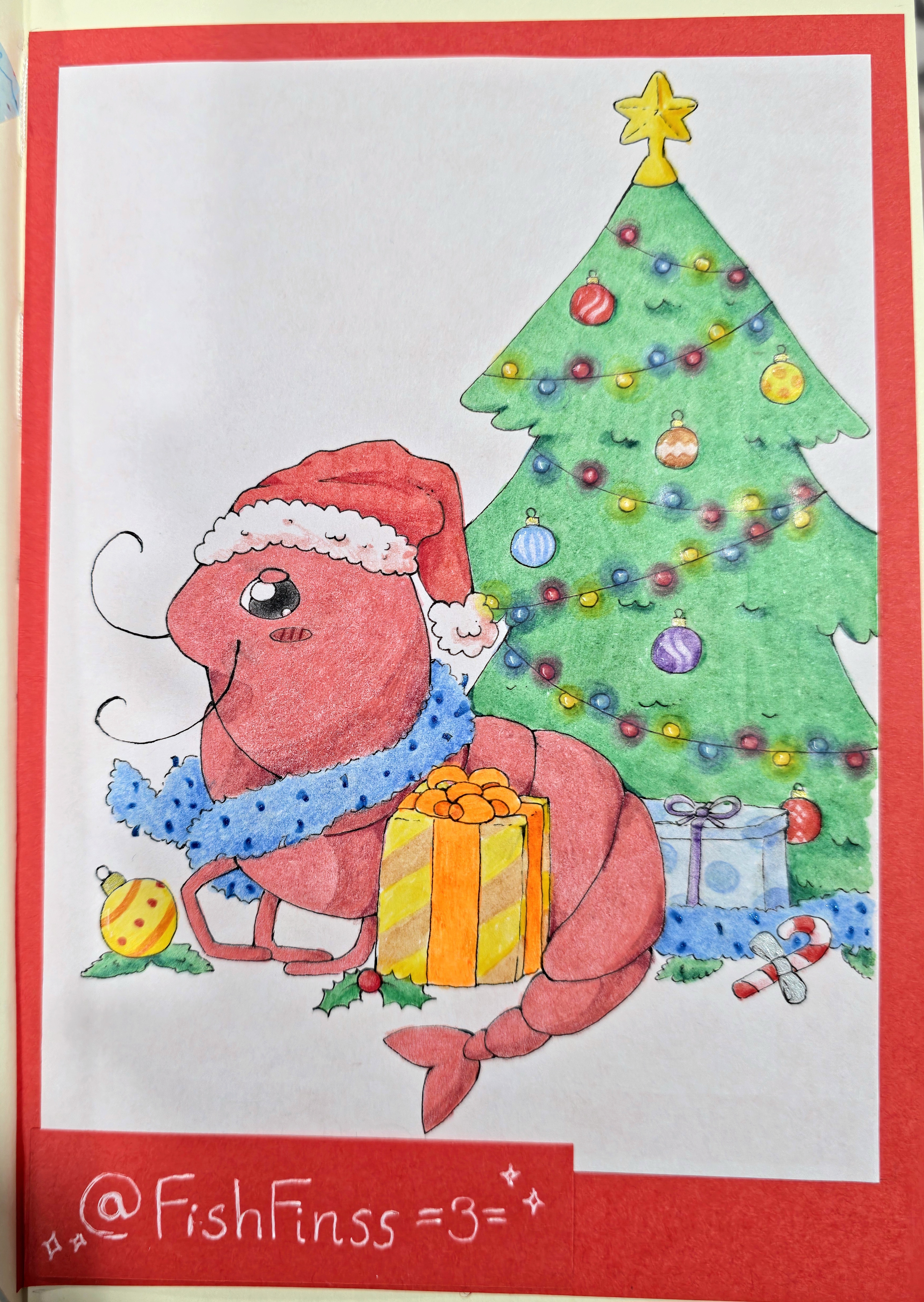 A traditional drawing done on paper with markers, pens and pencils. It depicts a cute little shrimp with a Santa hat, wrapped in a blue sparkly tree garland. There is a big gift in front of the shrimp and behind it, next to a Christmas tree decorated with baubles and Christmas lights. There's also a bauble on the left of the shrimp and a candy cane on the right. The background is white with a red frame.