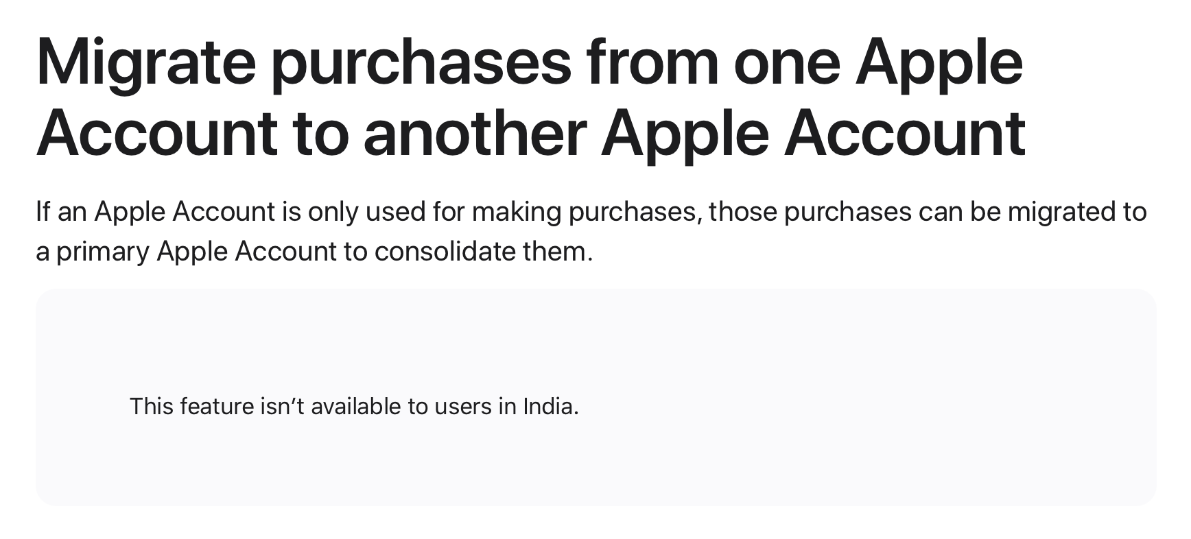 Screenshot of the headline of an Apple support article titled "Migrate purchases from one Apple Account to another." Below it, in an alert box, a message says "This feature isn't available to users in India."