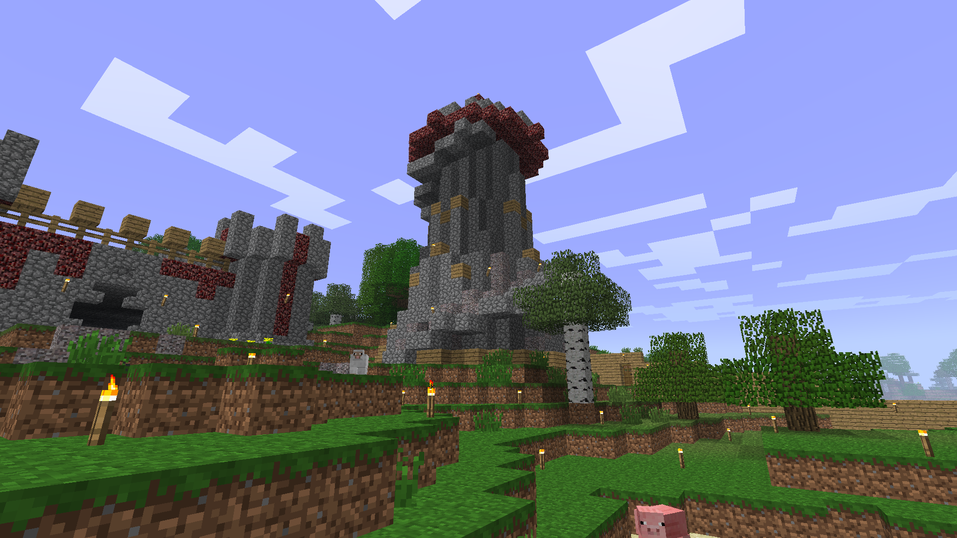 Screenshot of a cool, wizard-like tower built in beta-style Minecraft, mostly out of cobblestone but with a pointy Netherrack roof.