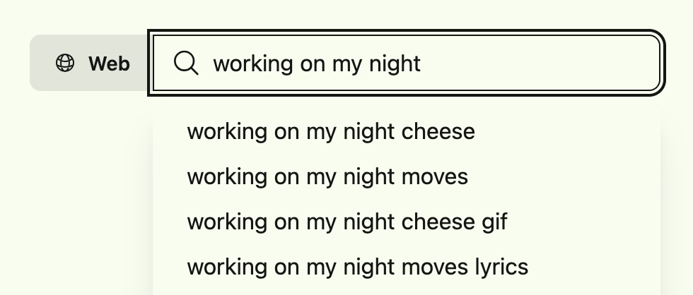 Search box where the user has entered "working on my night," and "cheese" is the first autocomplete result. "moves" is second, followed by "cheese gif," then "moves lyrics."