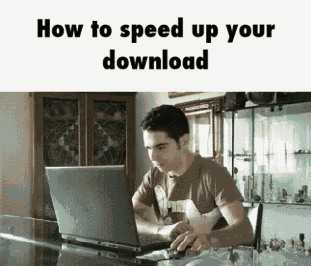 A gif illustrating a guy rotating his open laptop on its side (placing it vertically) for it to speed up displayed download bar with a caption "How to speed up your download"