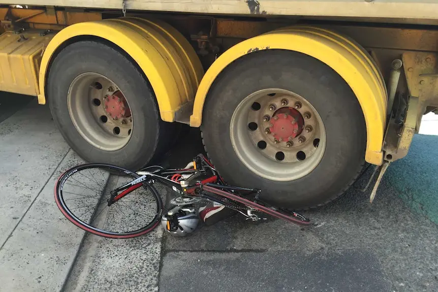 Truck crushing a bike