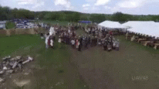 Viking reenactor throws spear at drone