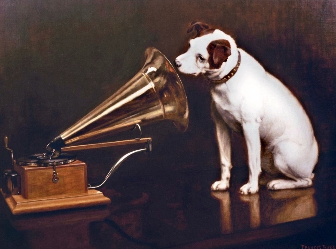 His Master's Voice: a photograph of a dog listening to a gramophone